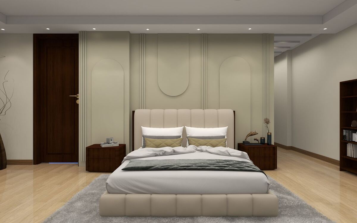 Bedroom with a panelled headboard wall