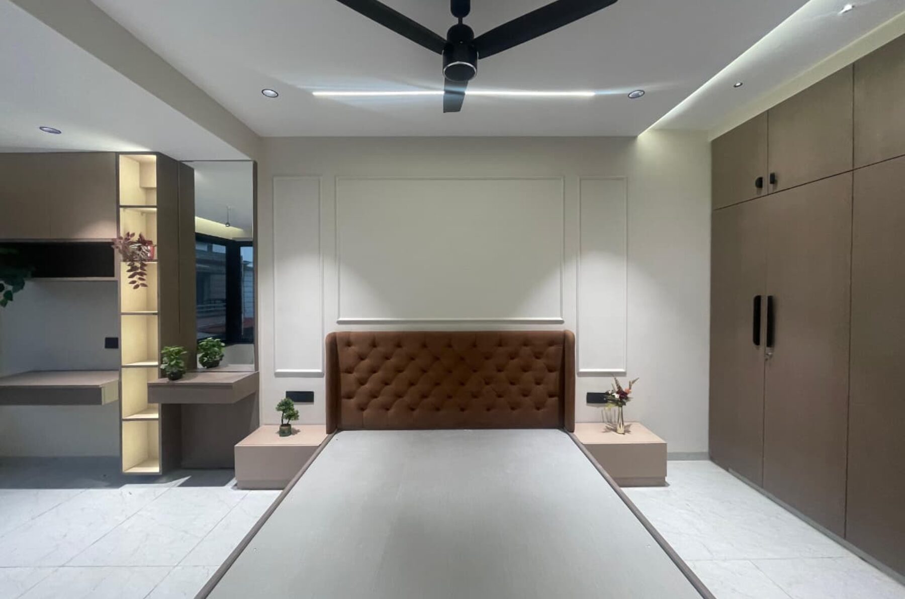 Bedroom with full-height wardrobes